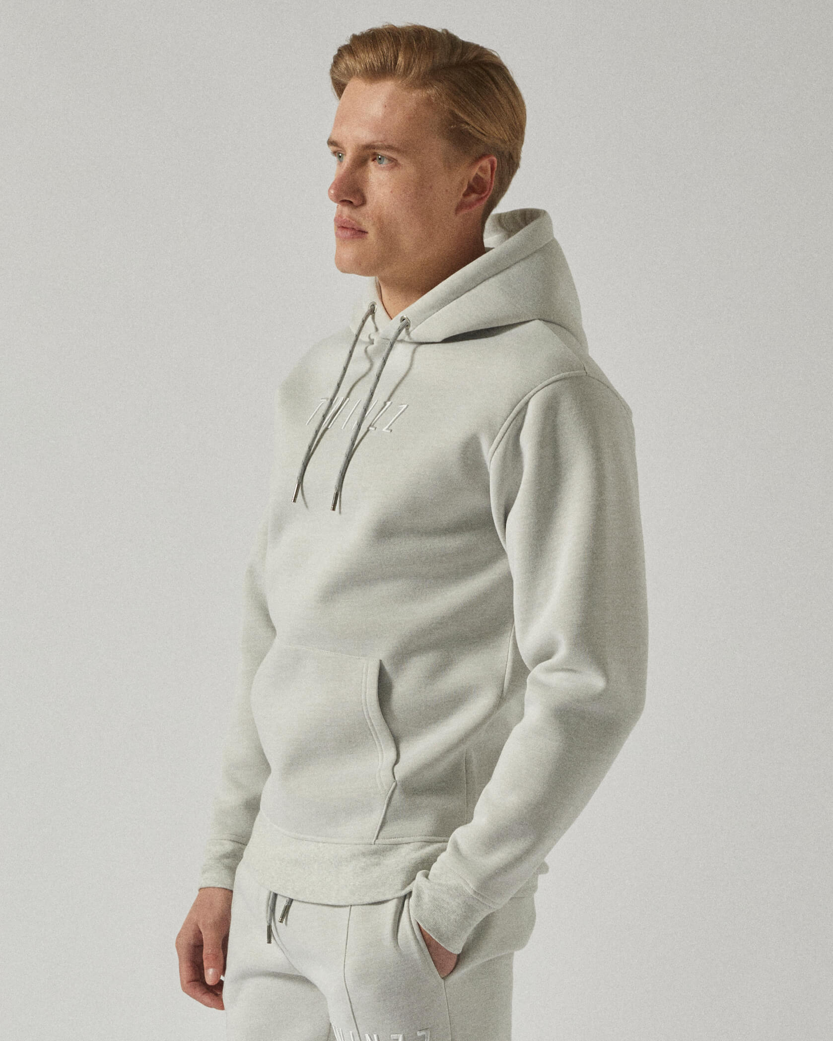 Twinzz grey hoodie on model