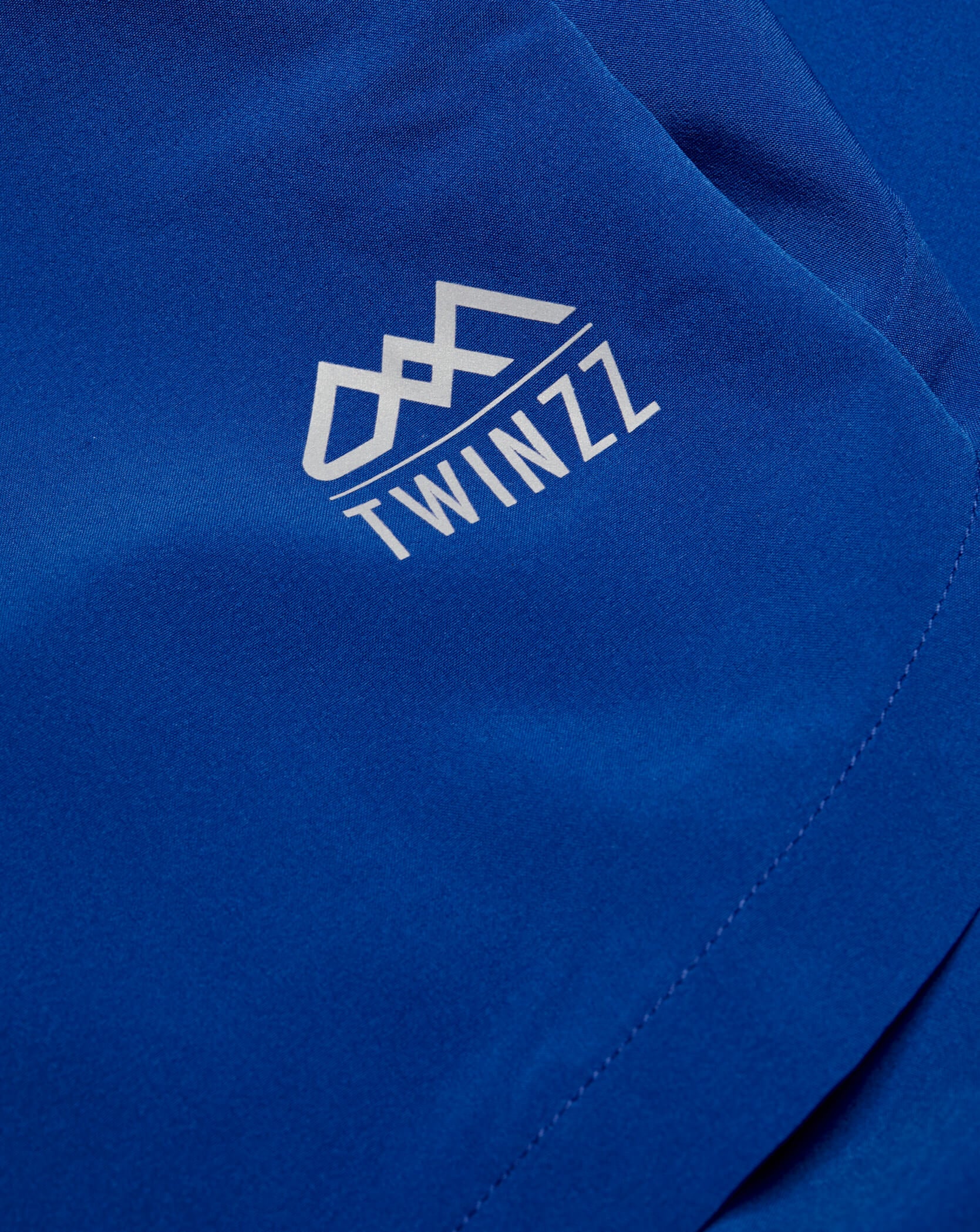 Twinzz blue active shorts logo