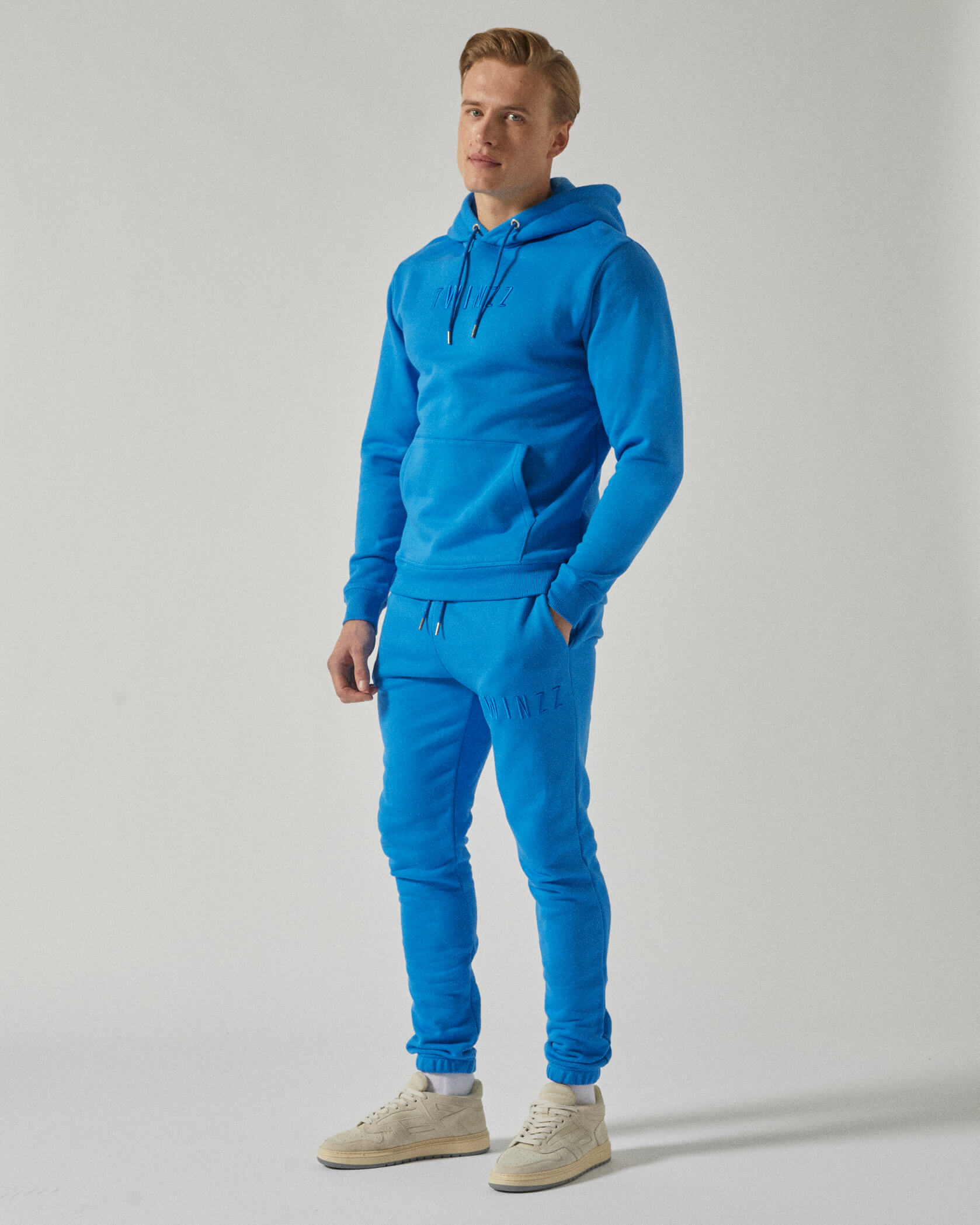 Blue Twinzz Joggers and hoodie on male model