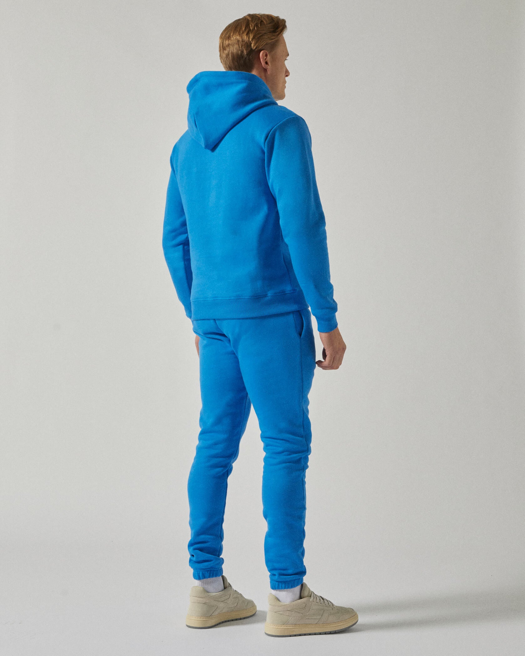 Blue Twinzz Hoodie and joggers on male model