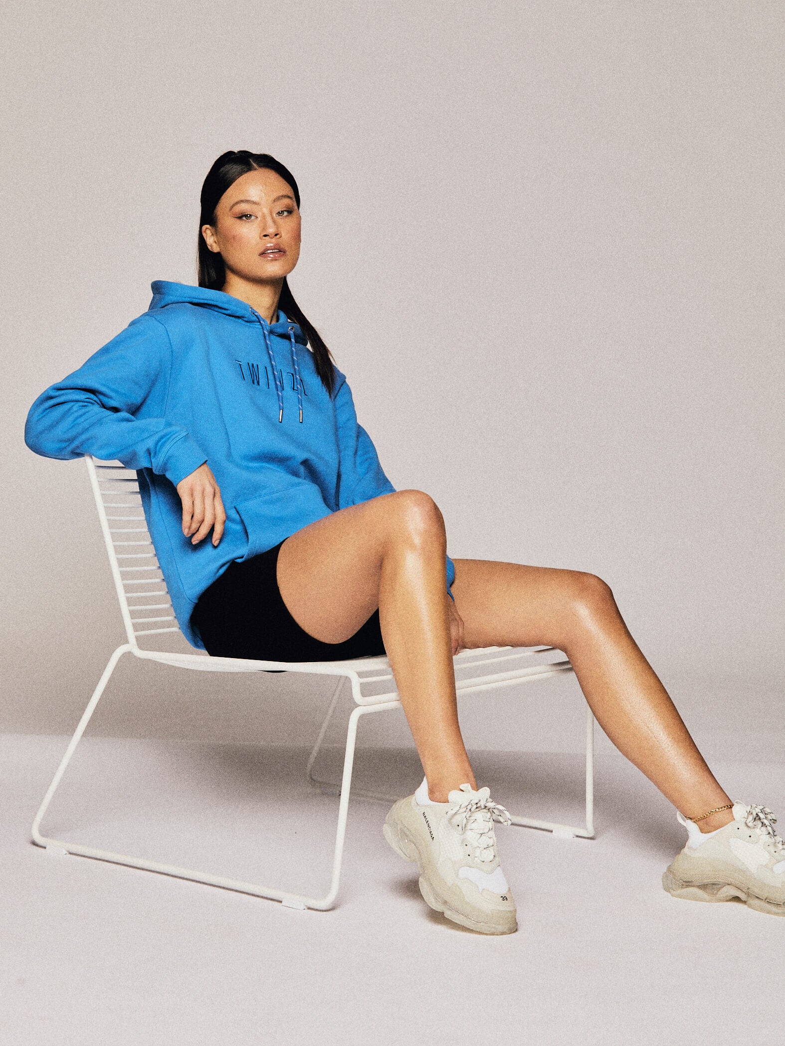 Twinzz blue hoodie on female model