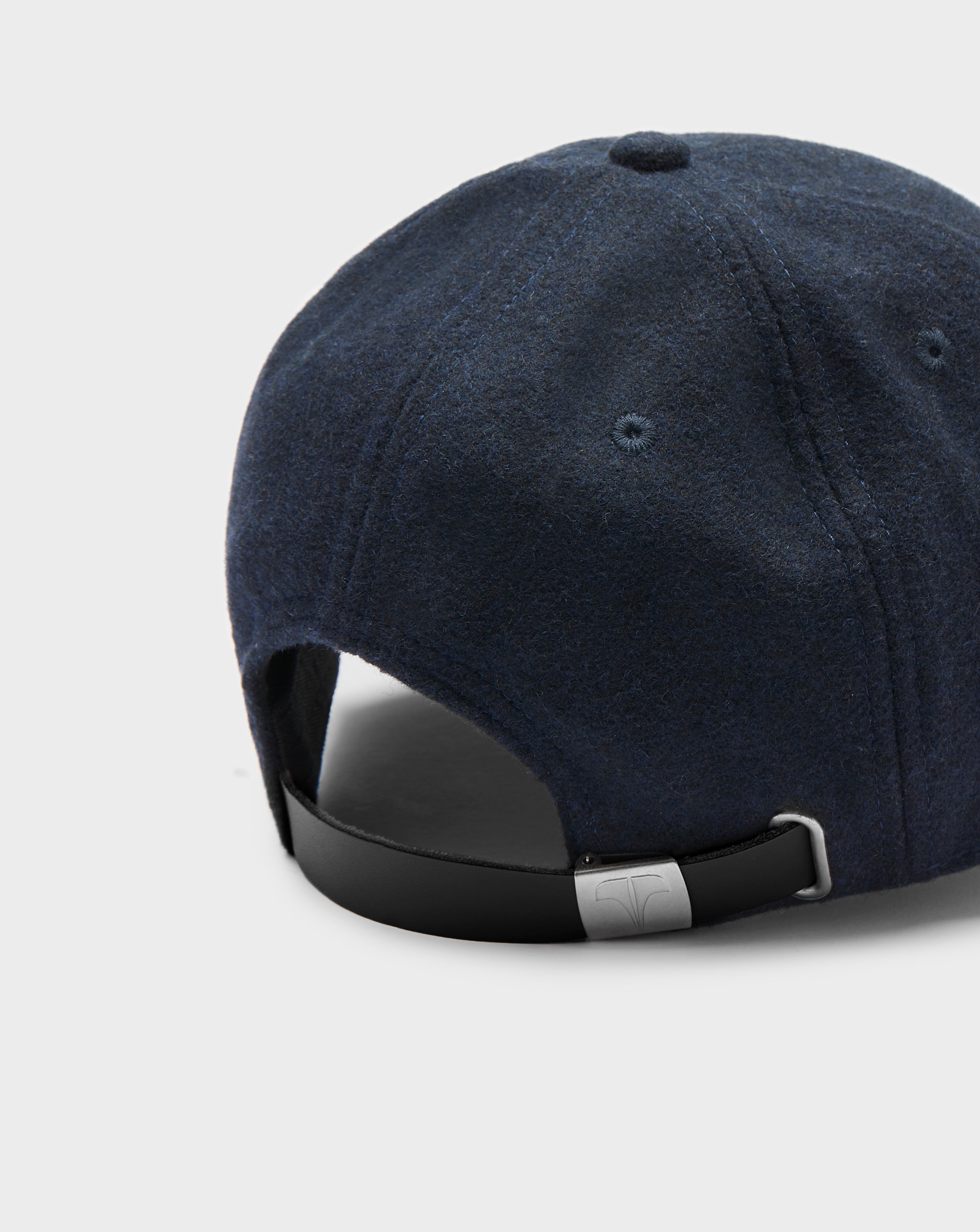 Twinzz navy pitcher cap with small silver logo strap