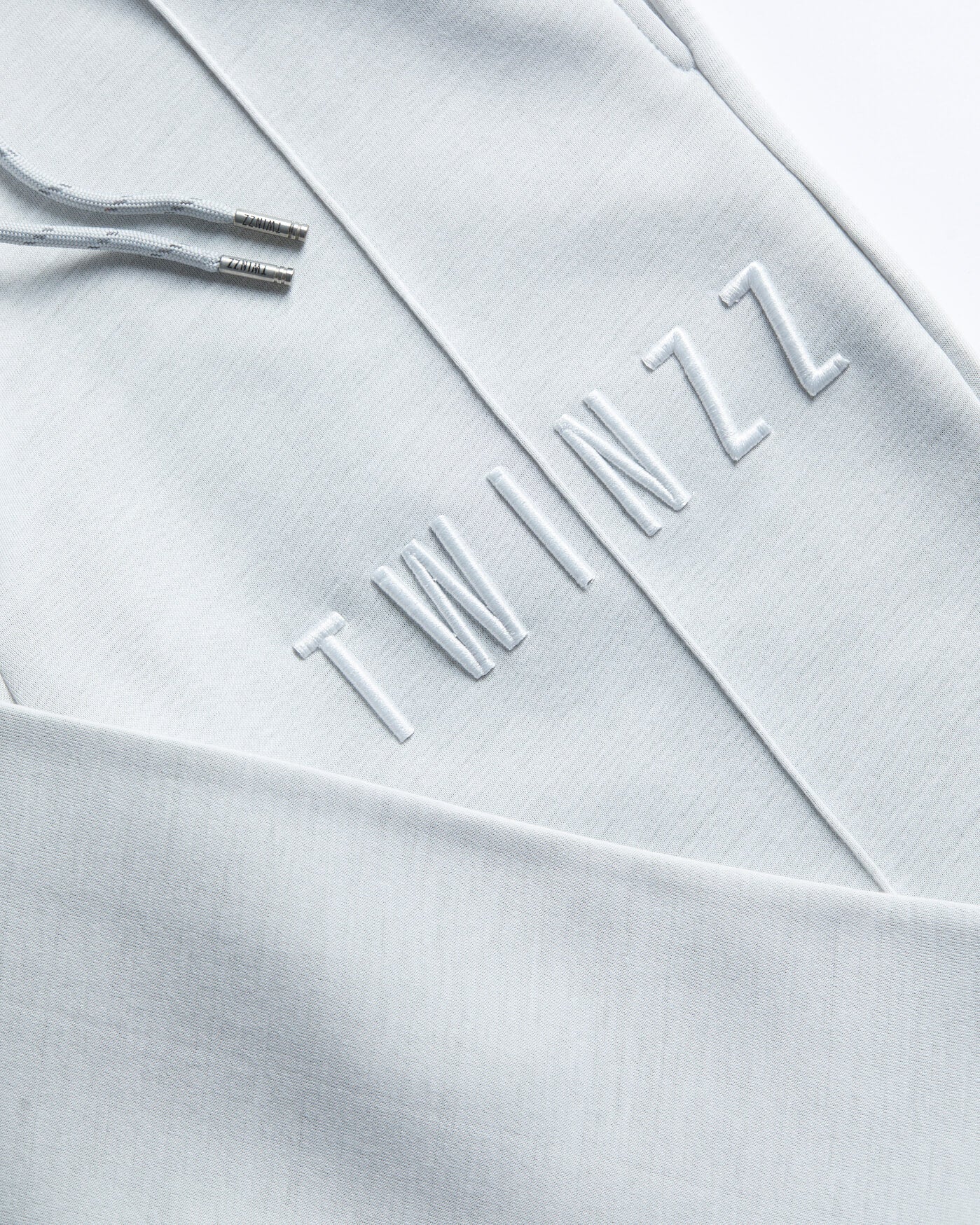 Twinzz grey joggers logo