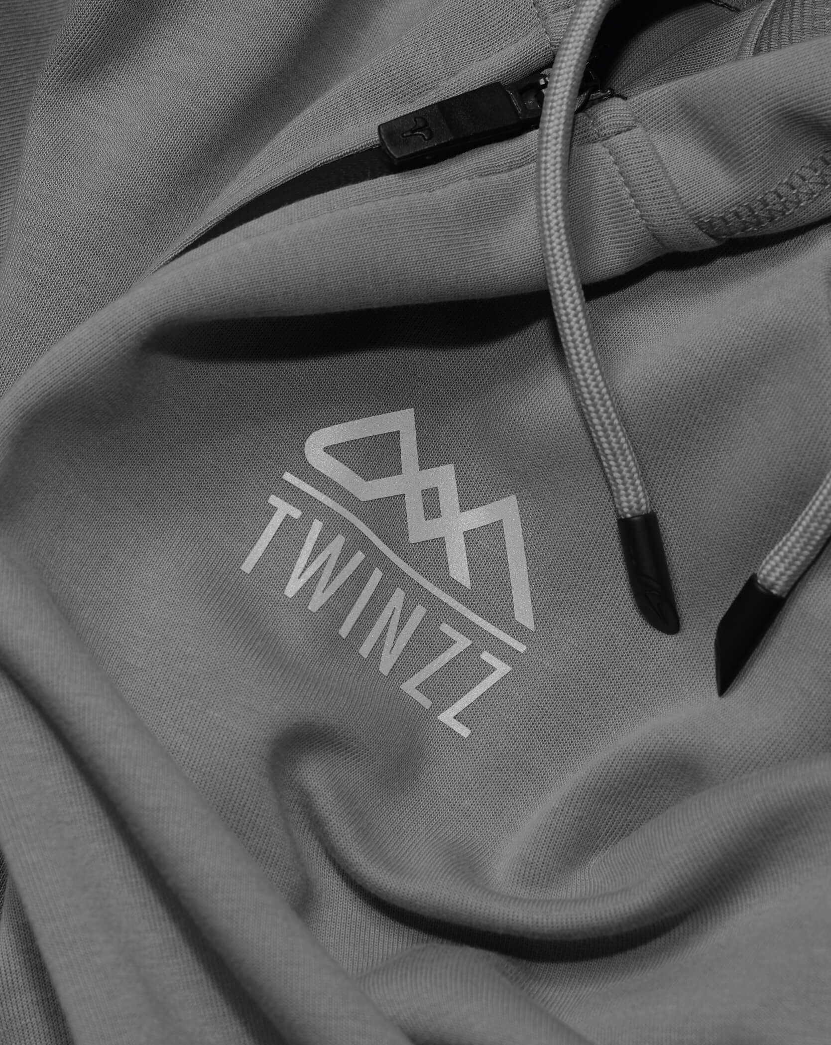 Twinzz grey tech hoodie logo