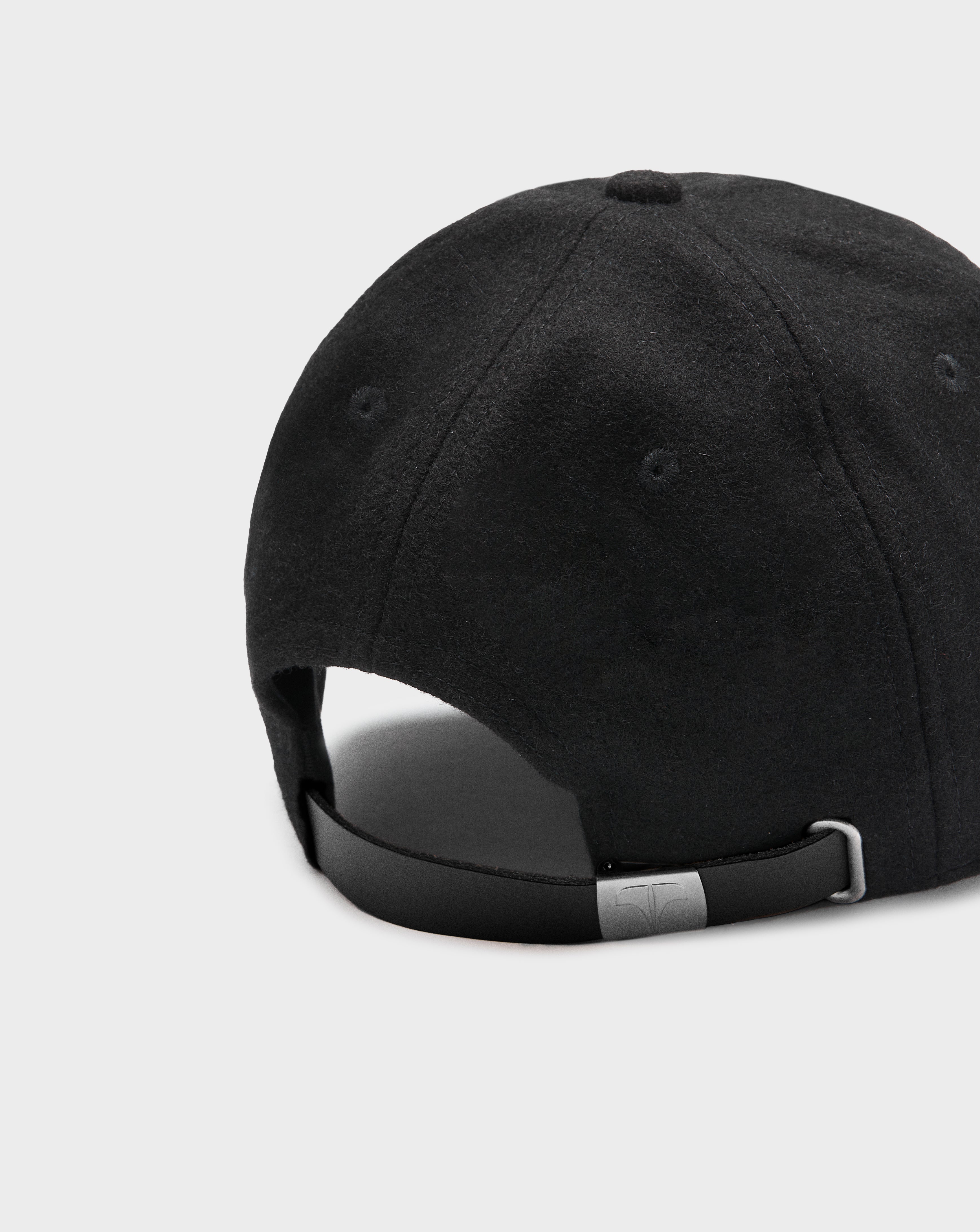 Twinzz black pitcher cap with small silver logo strap